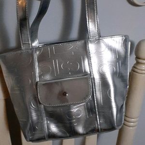 COPY damage.  Liz Claiborne Bag 🛍️ 10 inches width and 8-9 inches vertical. 🛍️